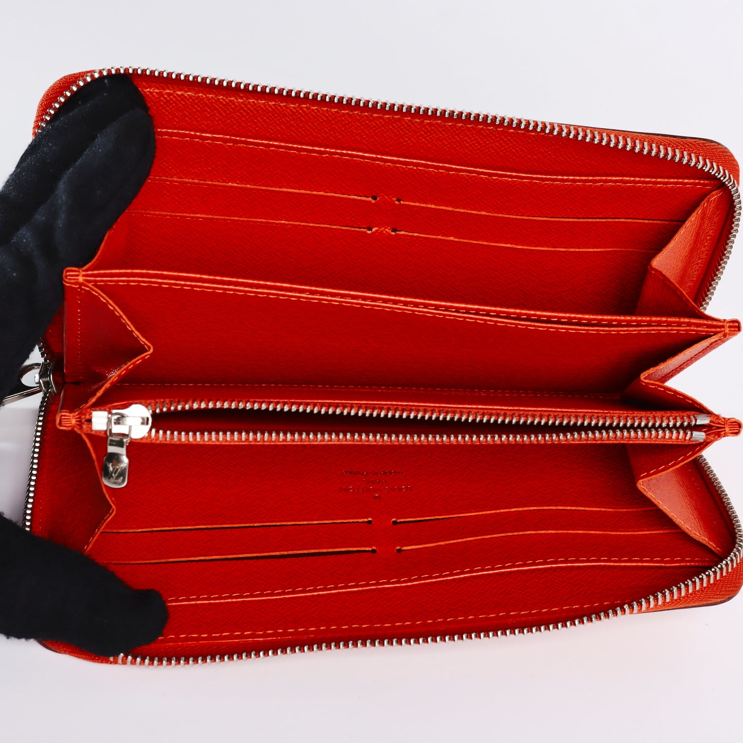 Pre-Owned Louis Vuitton Zippy Orange Epi Leather Wallet 78484357
