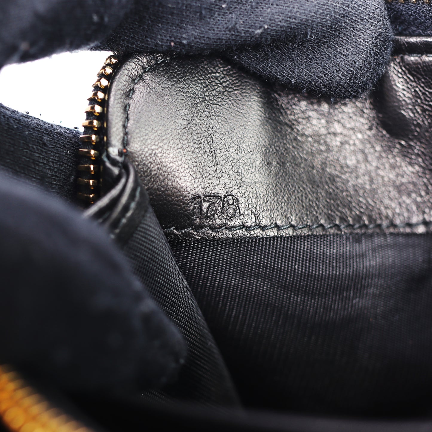 Pre-Owned Miu Miu Matelassé Orange Calfskin Studded Zip-Around Long Wallet 32091519