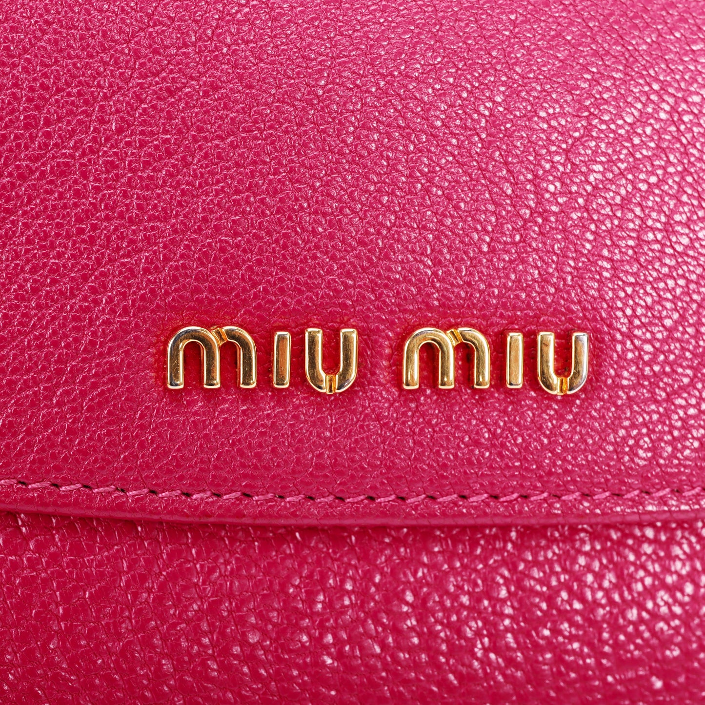 Pre-Owned Miu Miu Fuchsia Calfskin Compact Wallet 79748962